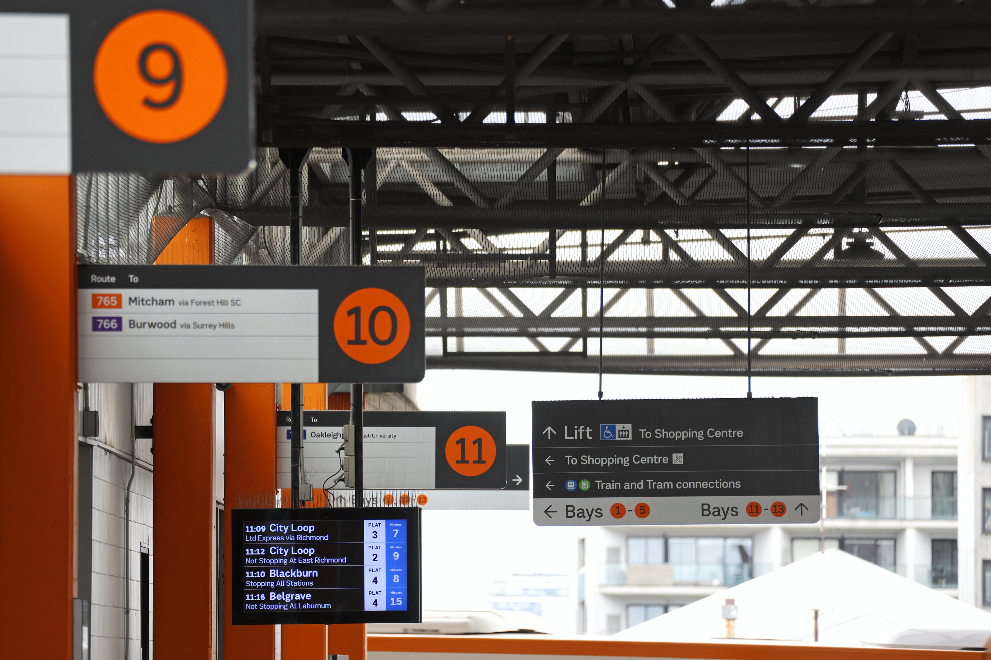 bus stop signs at Mitcham station