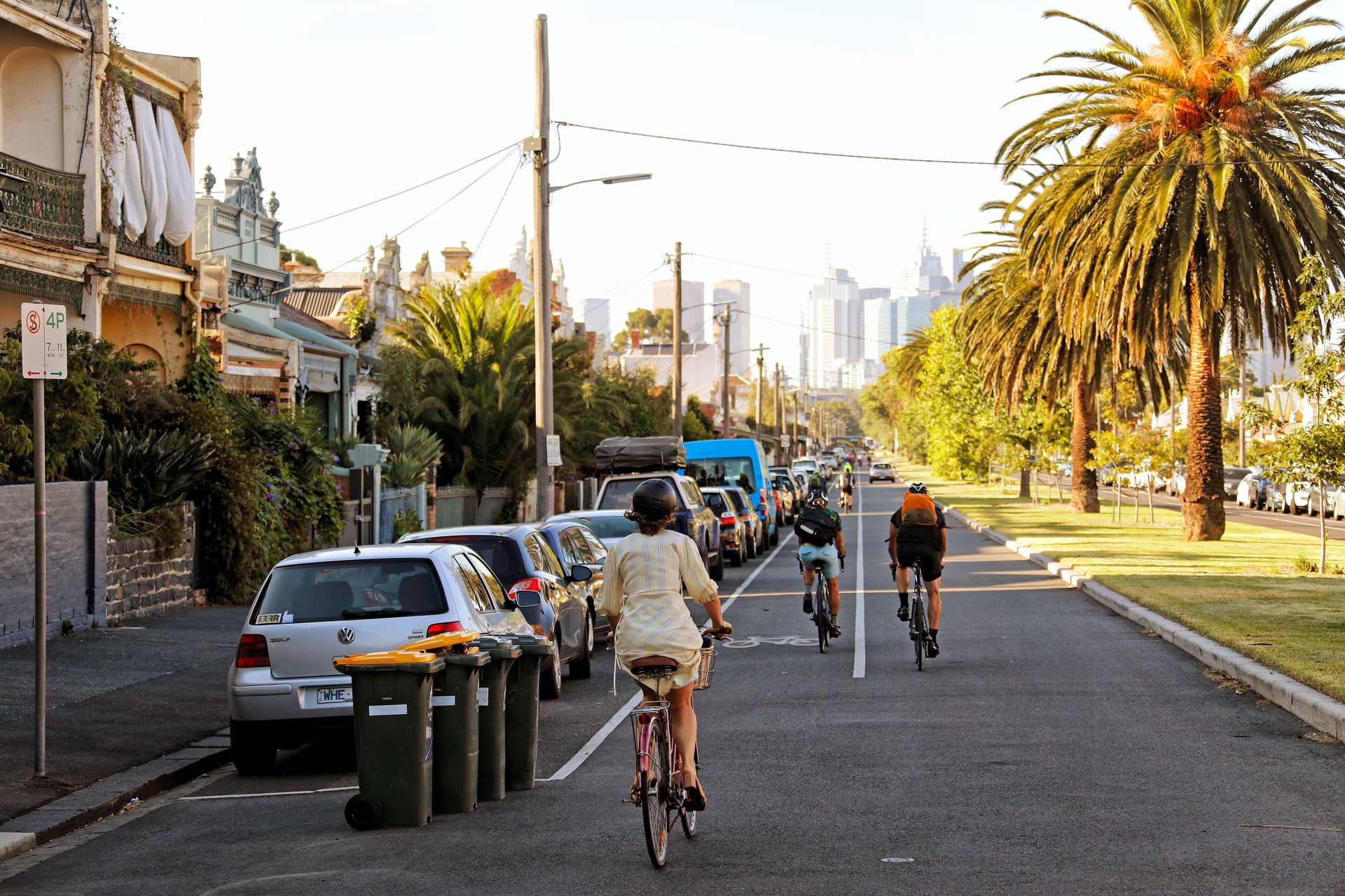 Street with bike lanes and cyclists riding